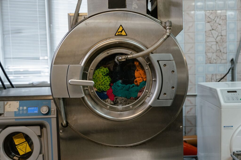 Inverness Dryer Vent Cleaning: Your 2026 Home Safety Checklist 1 technician performing dryer vent cleaning inverness fl service inside a laundry room