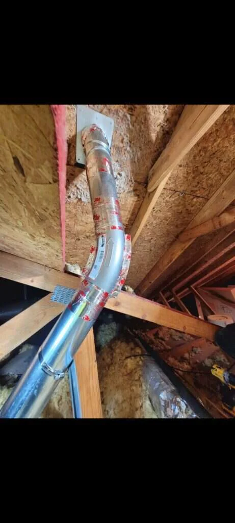 close-up of properly sealed dryer duct joint with foil tape